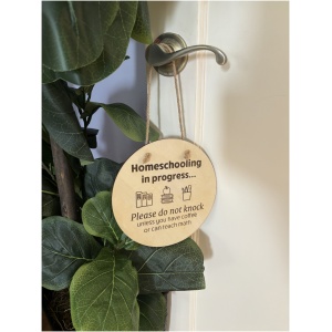a sign on a door handle