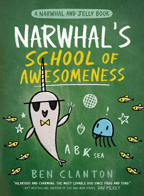 a chalkboard with a cartoon whale and fish